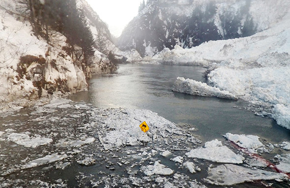 The Richardson Highway runs through the Keystone Canyon in the aftermath of a January 24 avalanche that closed the highway near Valdez, Alaska